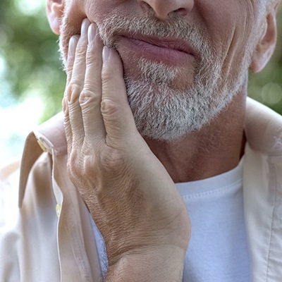 smiling man in the dentist chair